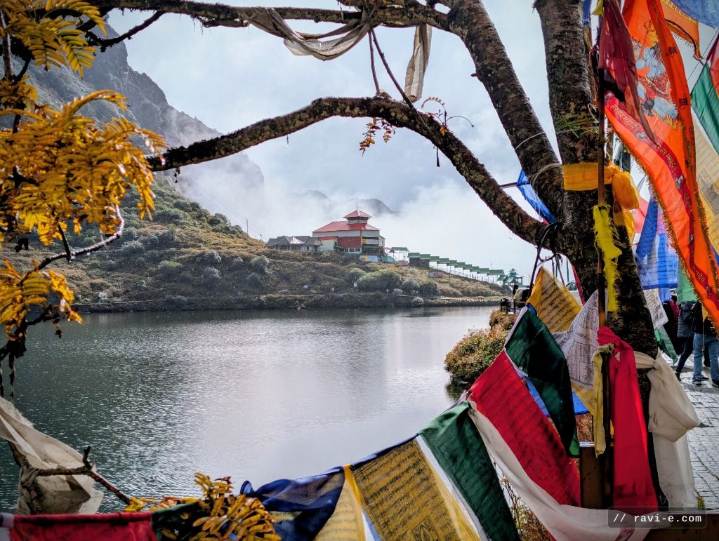 Tsomgo Lake with prayer flags in Sikkim